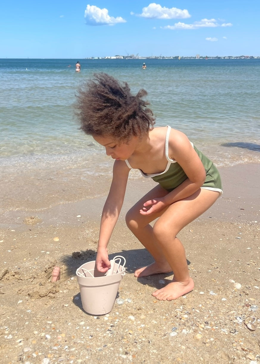 By The Beach | bucket + spade + pals